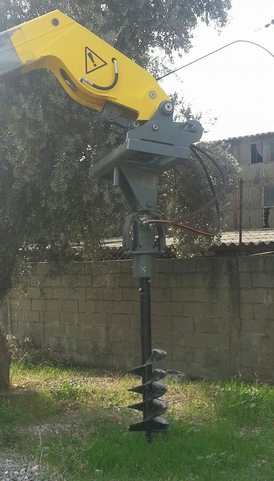 Kramer telehandler üzerine Digmaq toprak burgusu ataşmanı uygulaması Kramer telehandler üzerine Digmaq toprak burgusu ataşmanı uygulaması